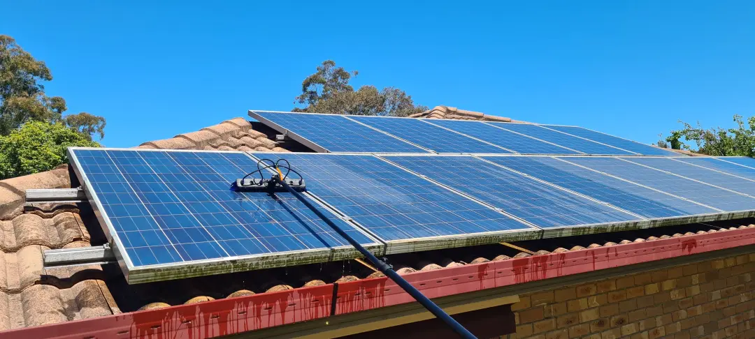 solar panels getting cleaned